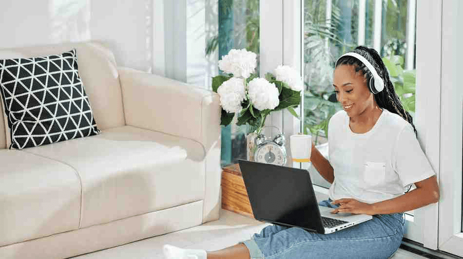 A pre-med student doing MCAT practice questions on her laptop at home.